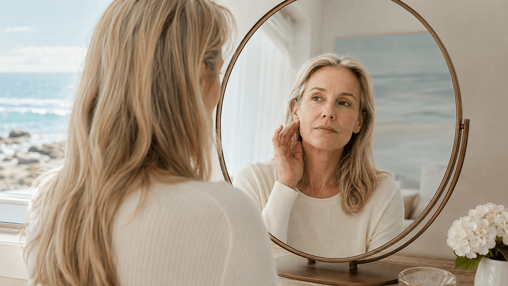 Woman calmly considering gradual and immediate facial volume options in a refined coastal interior